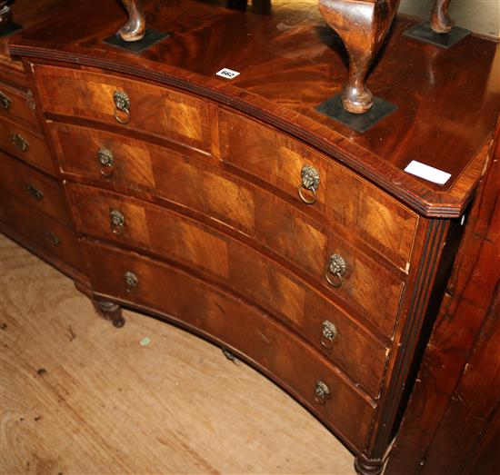 Concave walnut chest of drawers